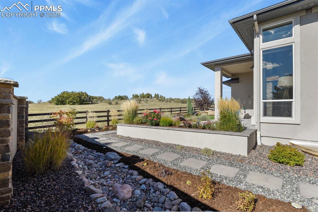 Professionally landscaped and home backs to open space 