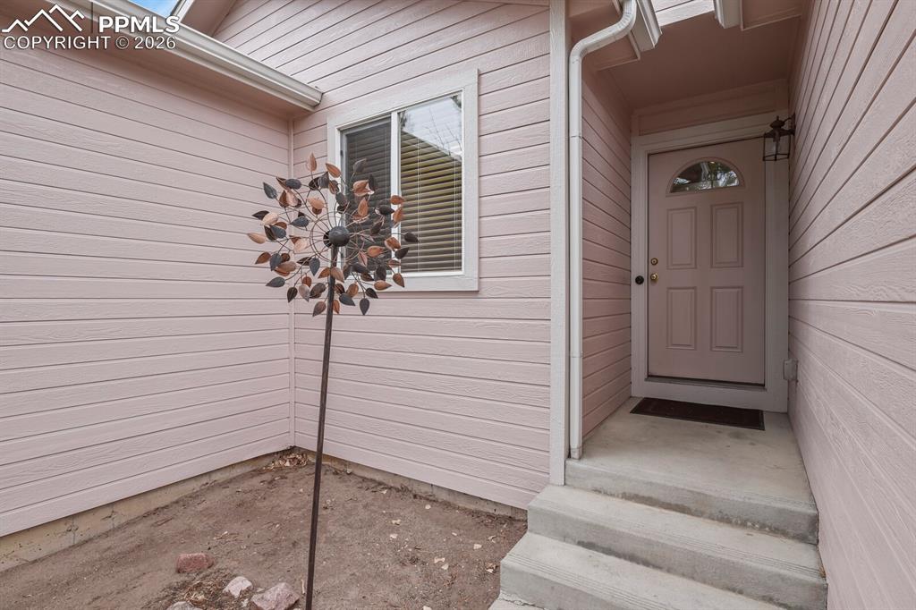 Convenient covered entry to the front door.