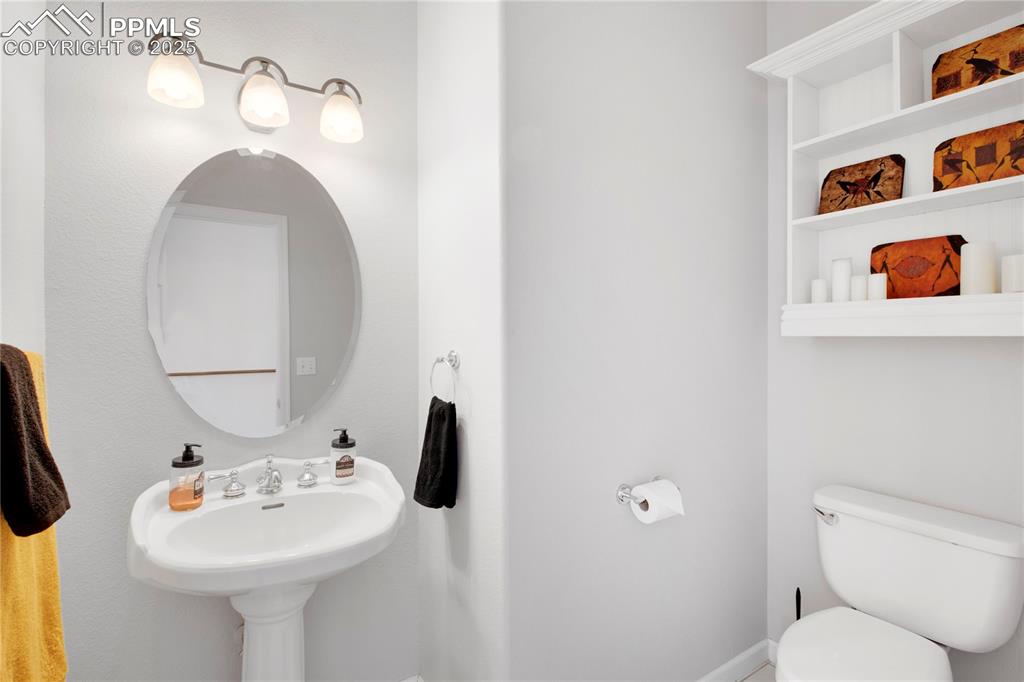 Half bathroom featuring toilet