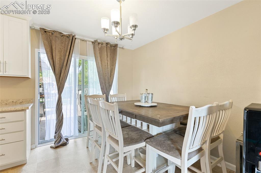 Dining area featuring a chandelier