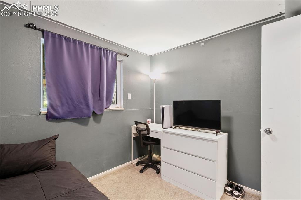 Office featuring carpet flooring and baseboards