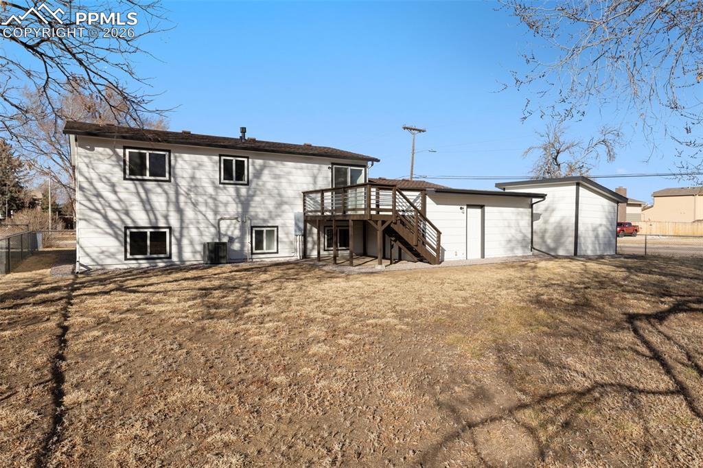 Expansive backyard with deck