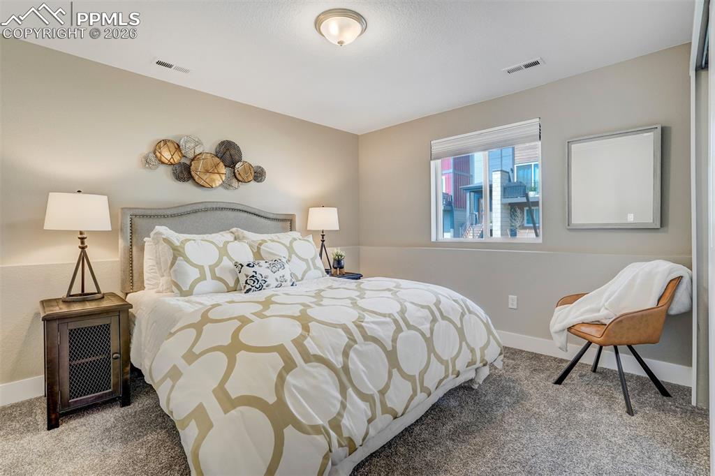 Bedroom featuring carpet