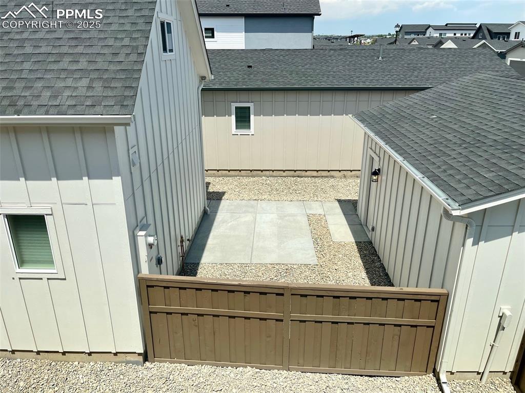 Back of home and detached garage