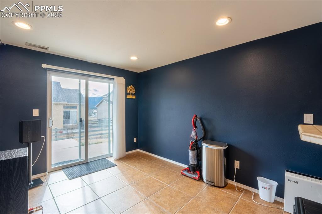 Walk out basement door off wet bar and living room/home theater - basement