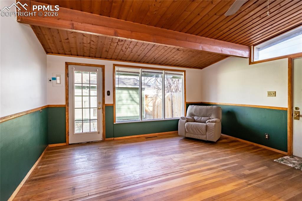 Living room to outside patio to garage.