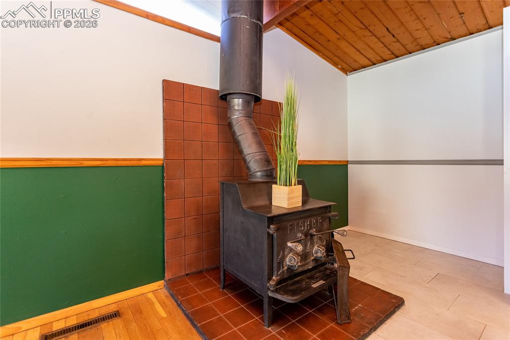 Wood burning fireplace and small breakfast nook.