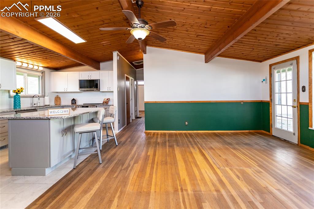 Newly painted interior with living room that opens to newly remodeled large kitchen.
