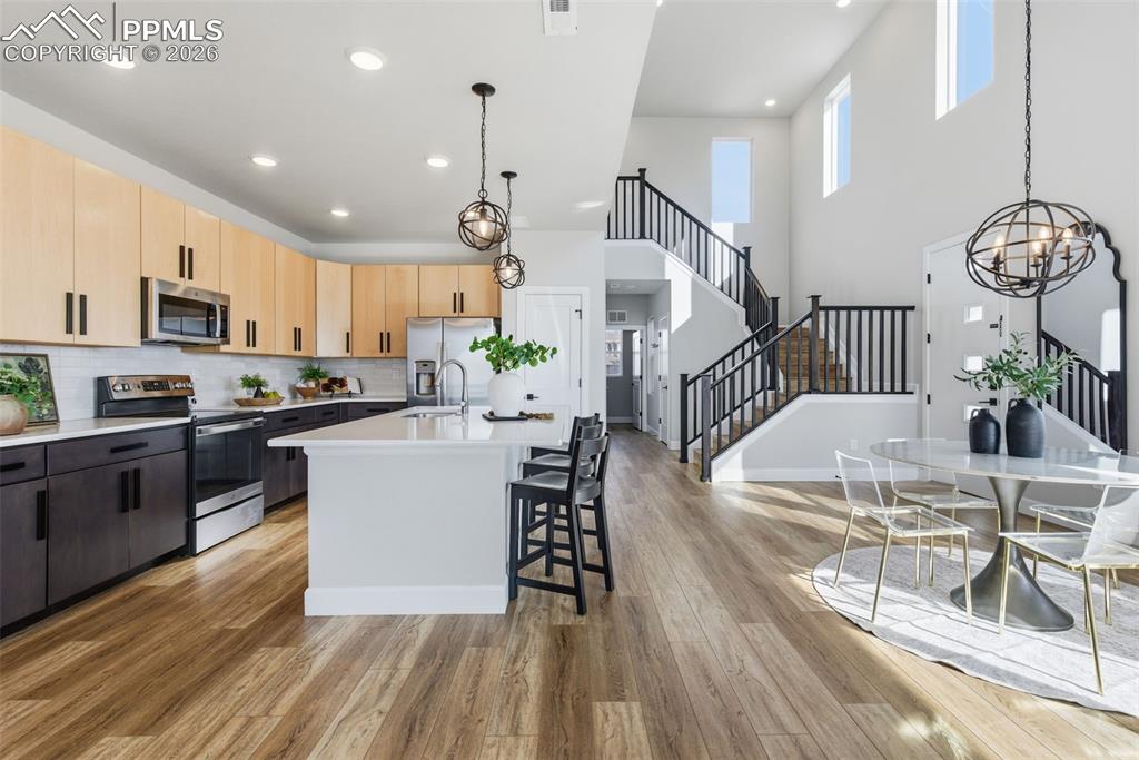 Upgraded 2-tone cabinets in this gourmet kitchen with natural gas access if desired