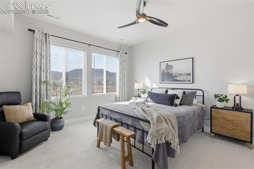 Owners' Suite with views and upgraded carpet and pad on the main level