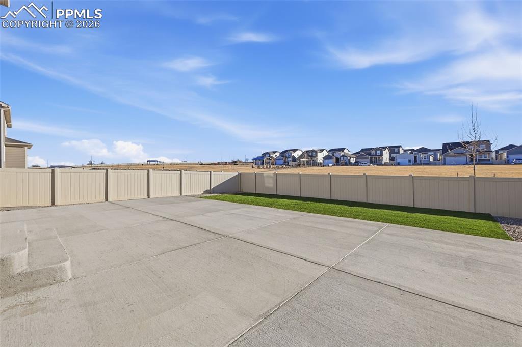 View of patio with a residential view