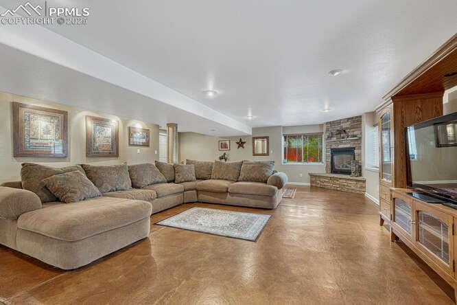 Family room with a stone fireplace, walk-out 