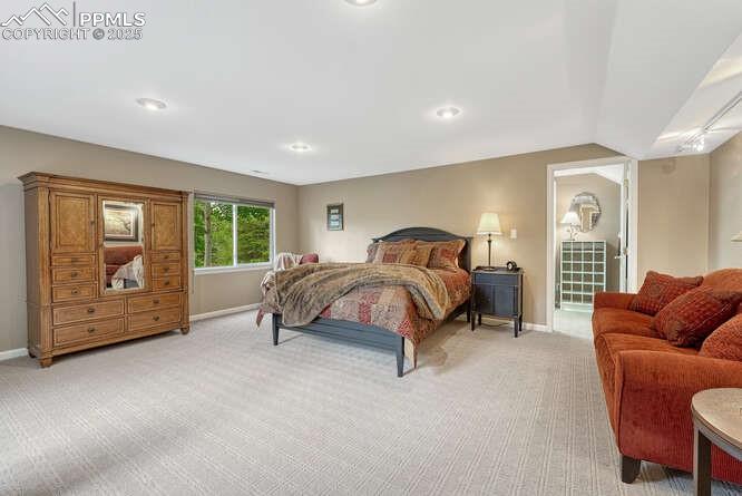 Bedroom featuring light colored carpet and recessed lighting