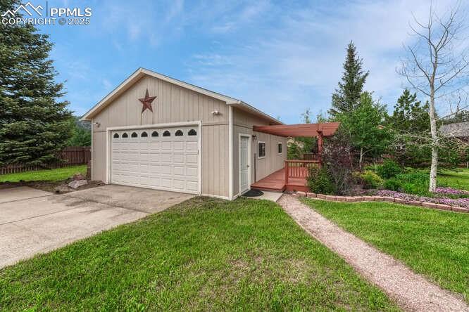 Garage/workshop featuring a heater