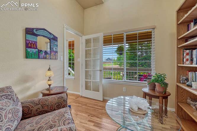 Office/Library area featuring wood floors