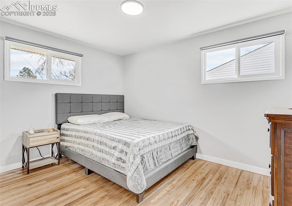 Third bedroom with beautiful hardwood floors.