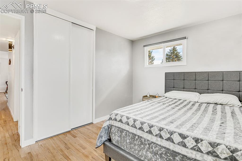 Third bedroom with beautiful hardwood floors.