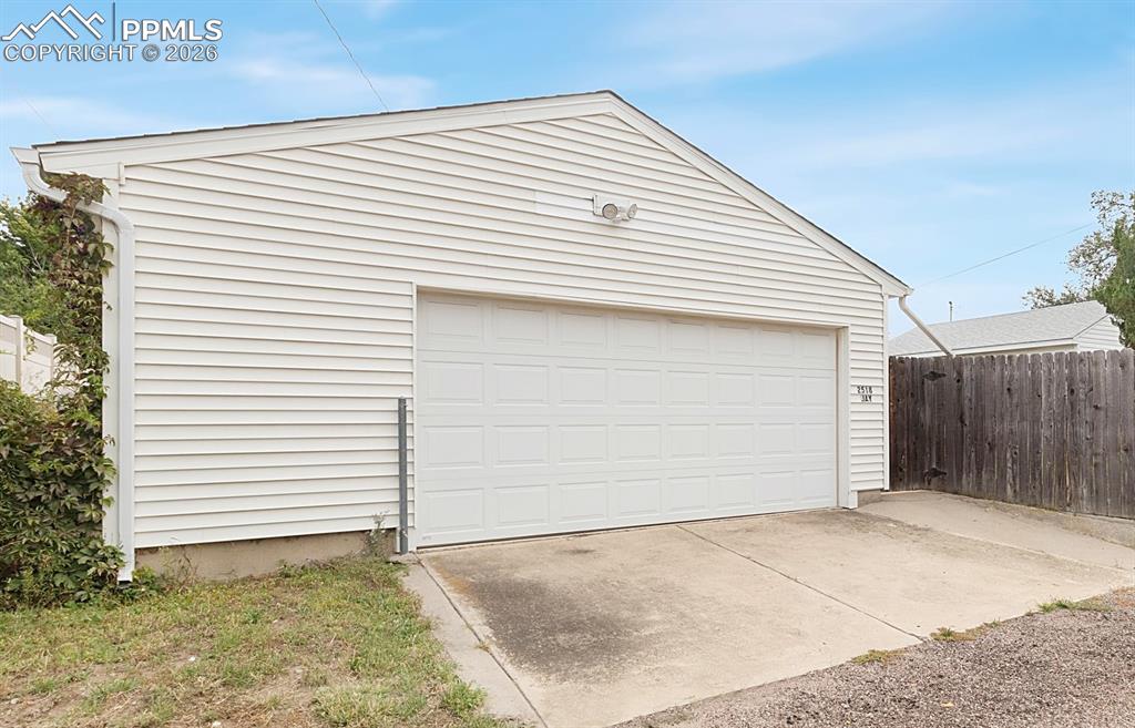 Oversized 2-1/2 car detached garage.