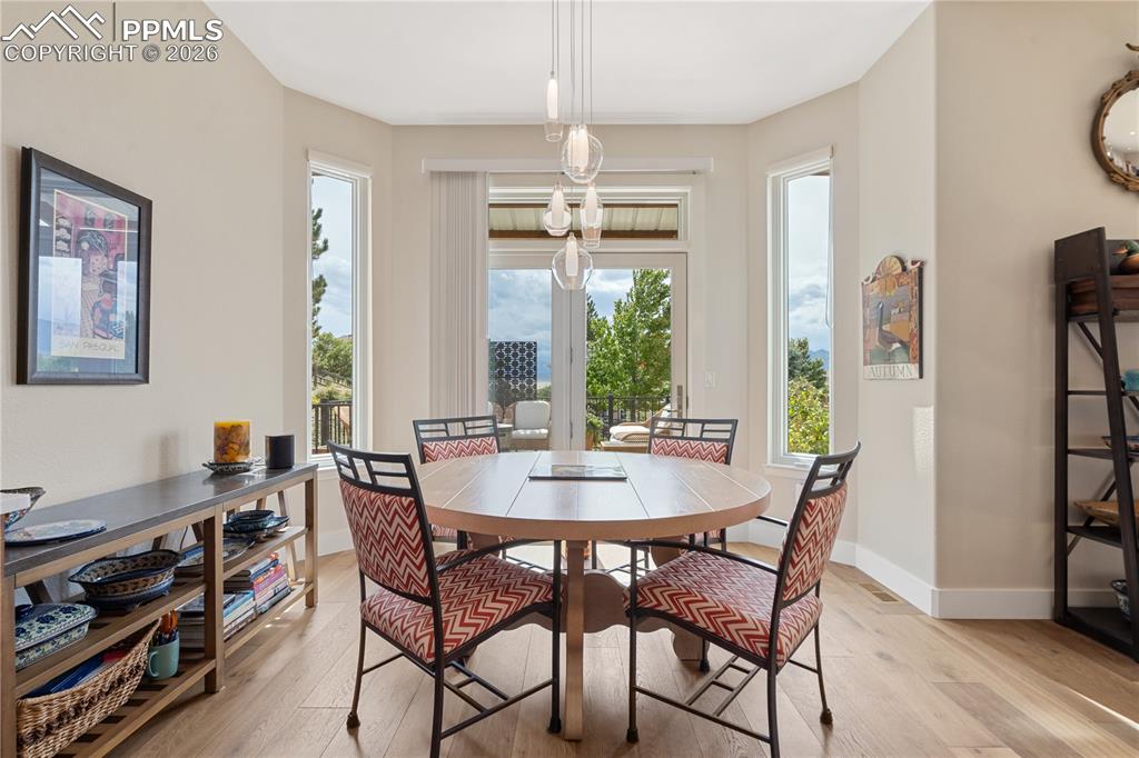 Eat in kitchen with newer Renewal by Anderson sliding glass door, newer LED lighting
