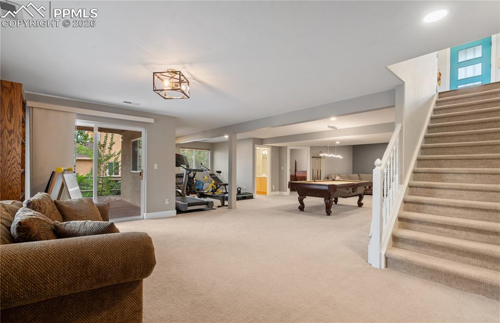 2nd family room in basement with walk out to concrete patio