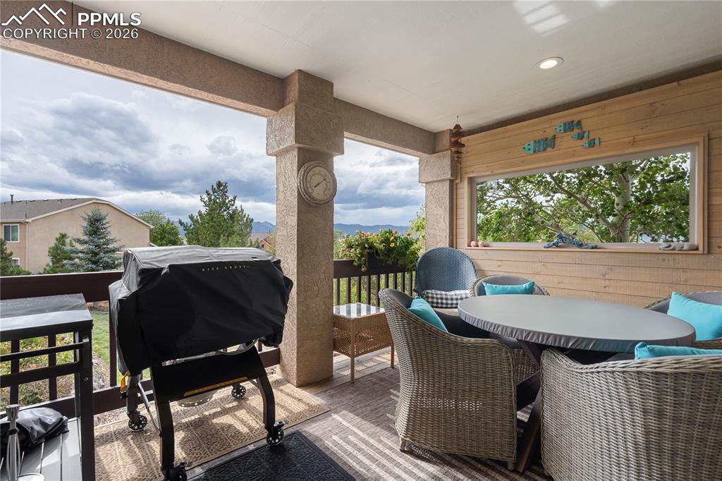 Enclosed and covered 10 x 14 deck with mountain views