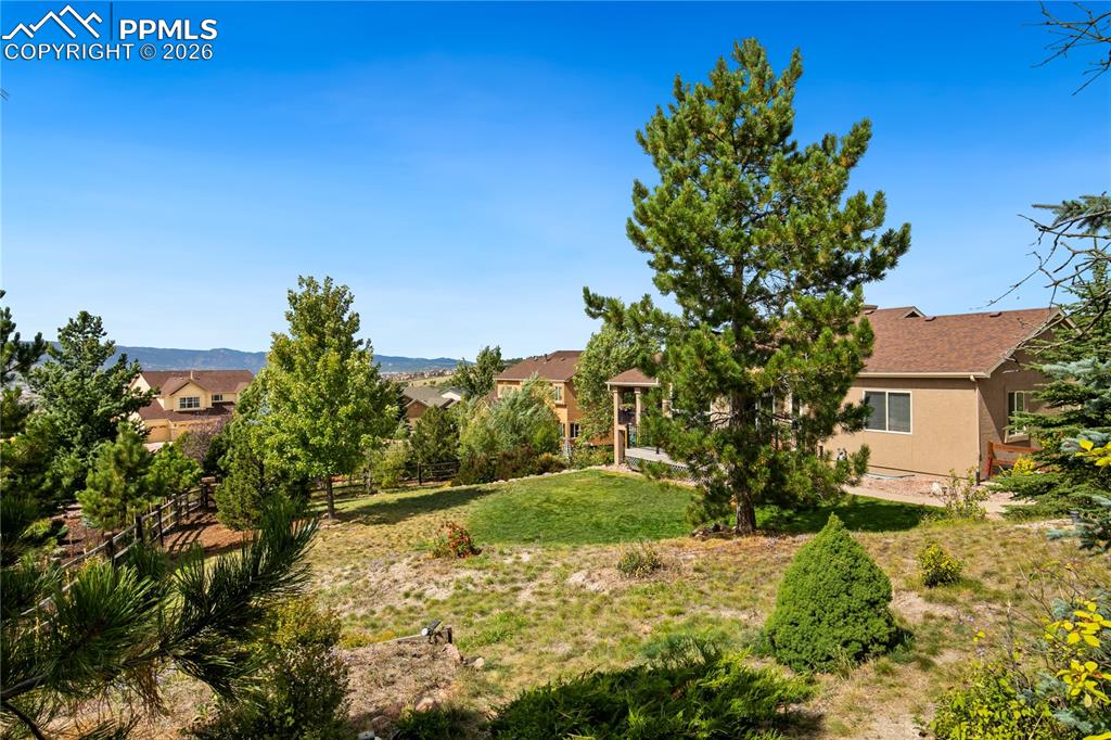 Backyard has fencing and plenty of room for children and pets