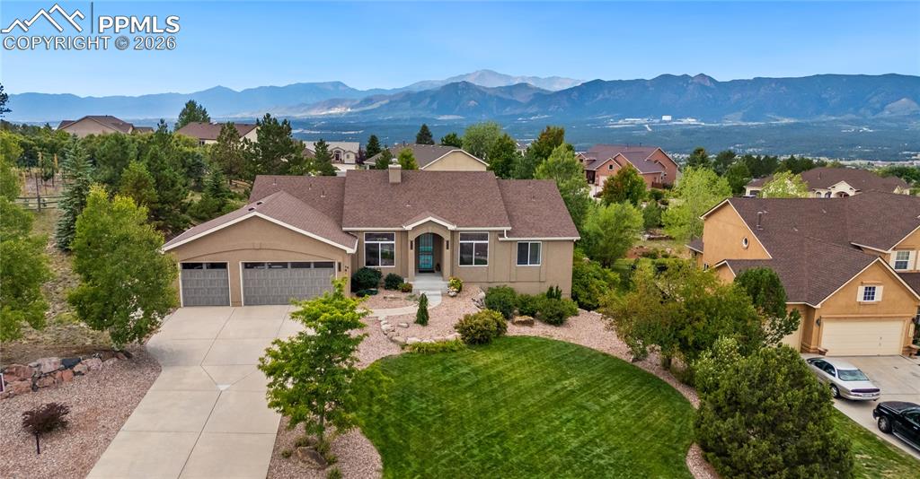 Aerial front view with United States Air Force Academy in the background