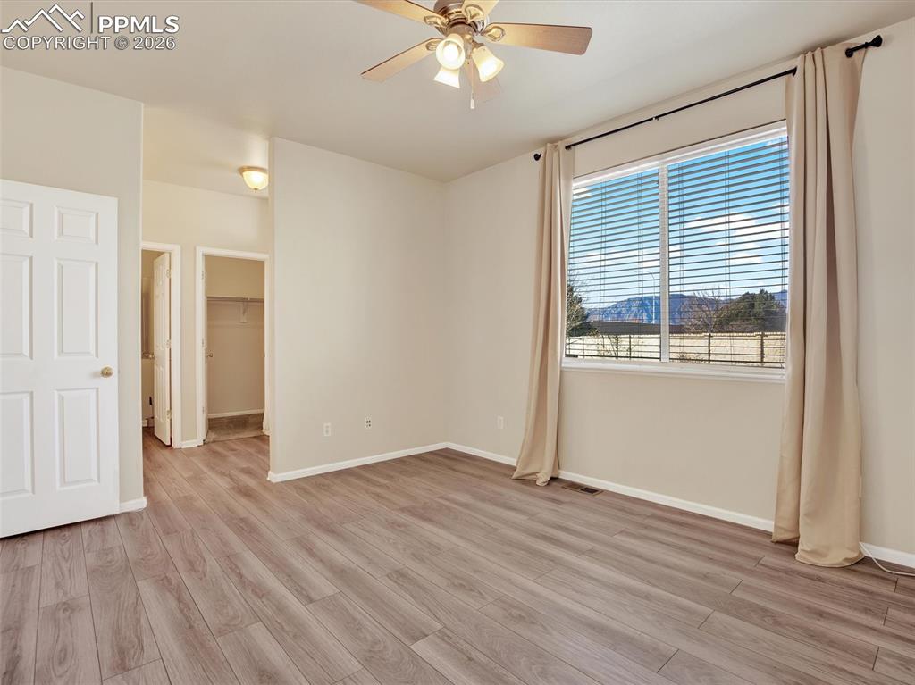 Primary bedroom with mountain views