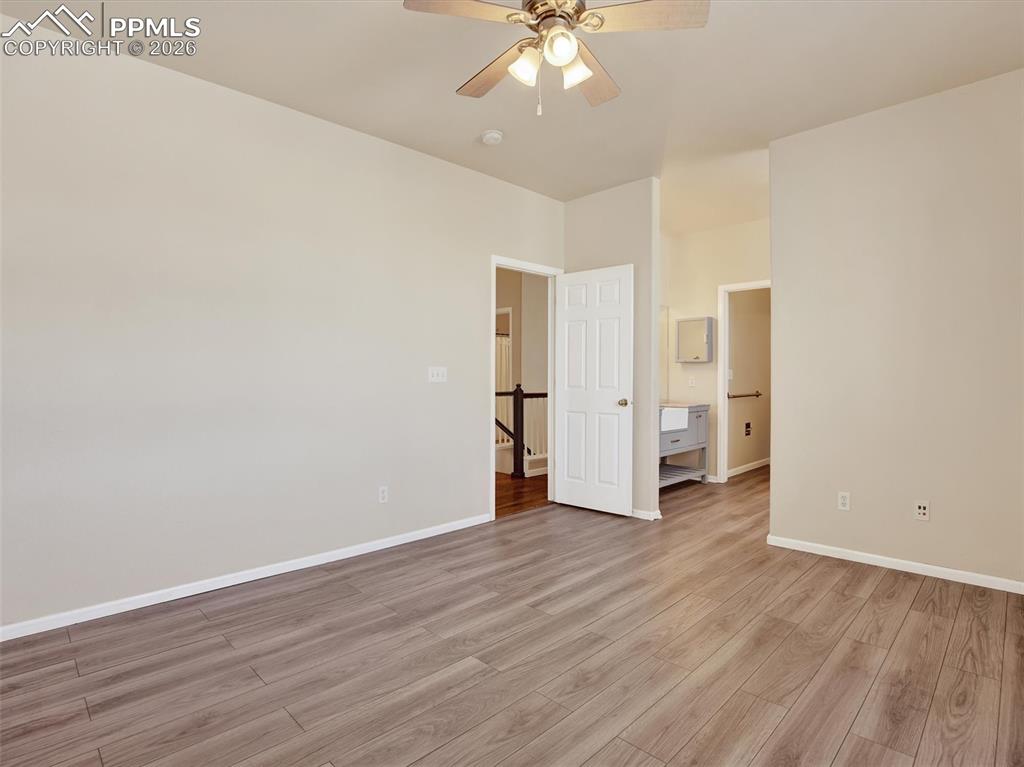 Primary bedroom and entry into ensuite