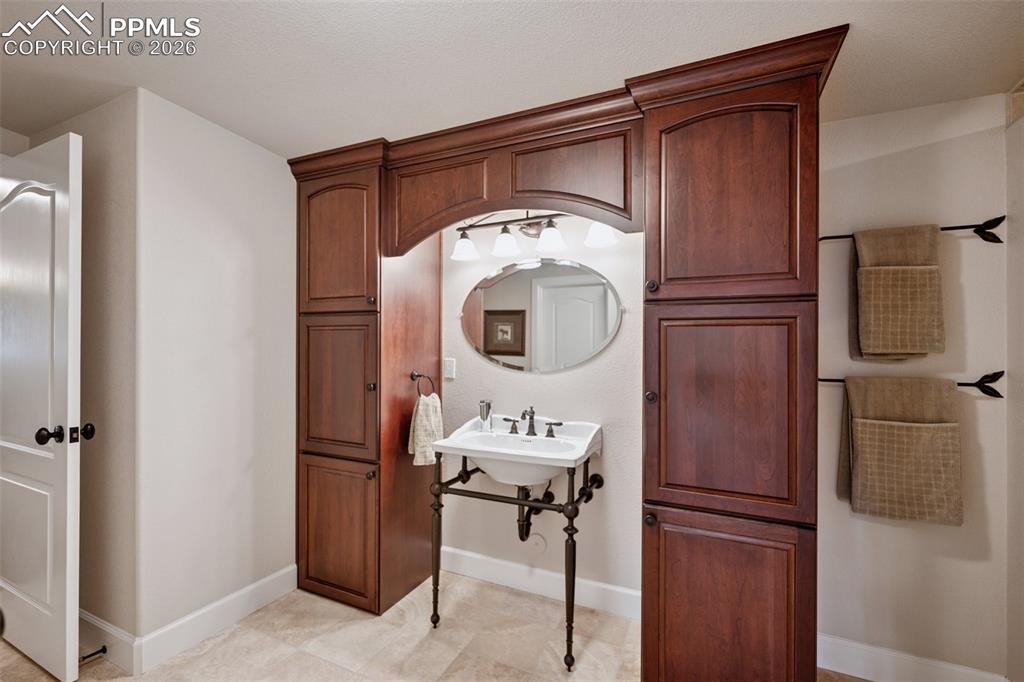 Bathroom featuring baseboards