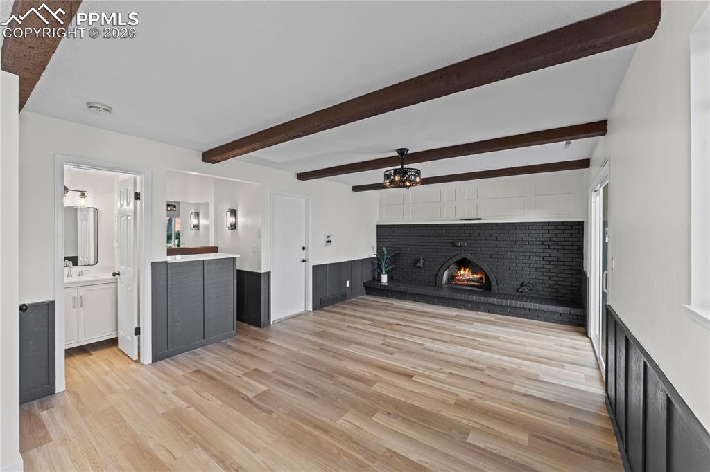 Family room w/ wood burning fireplace