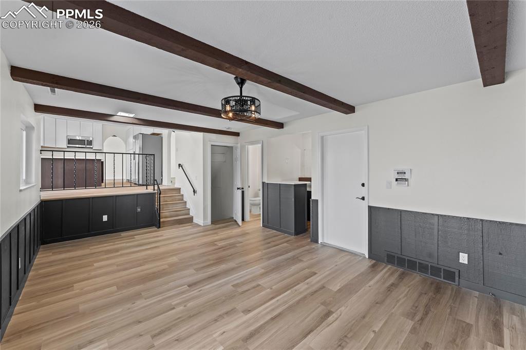 Family room w/ wood burning fireplace