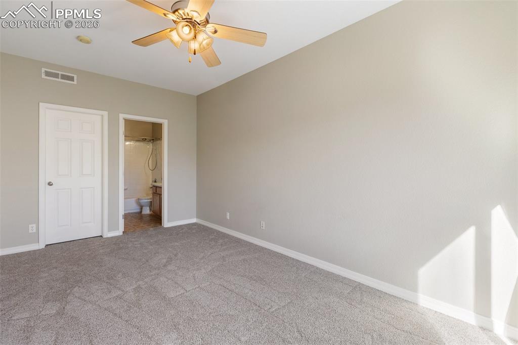 Primary bedroom with adjoining bath