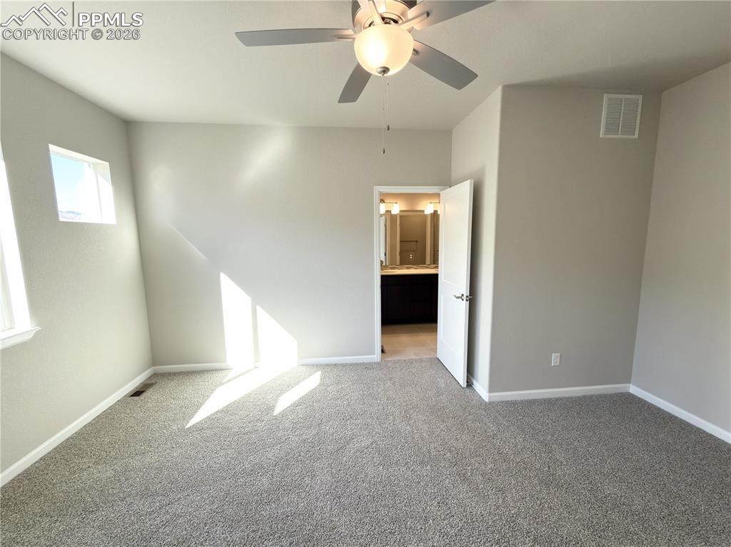 Primary Bedroom located on the Main Level with Walk-in Closet and Luxurious 4 Piece Bath!
