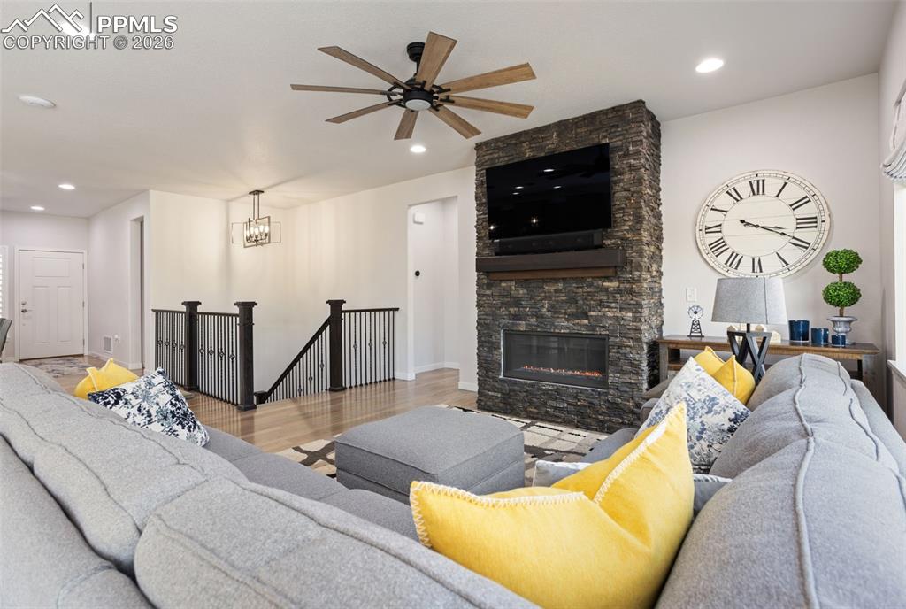 View from living room to stairs leading to lower level