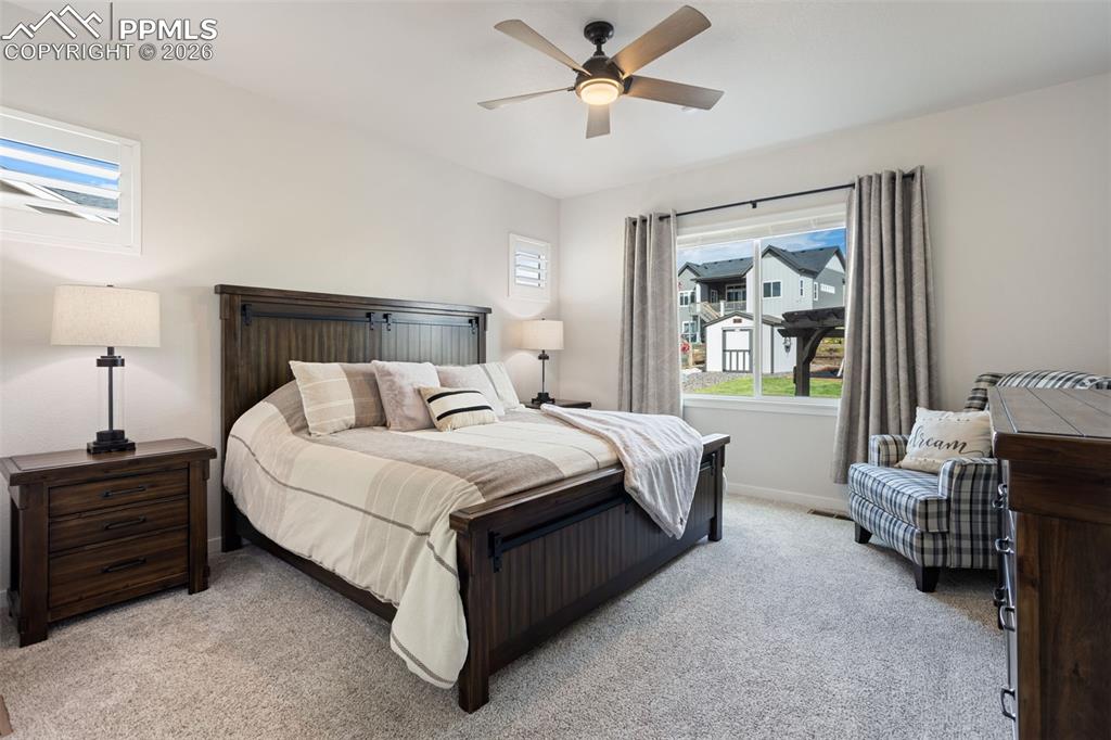 Primary suite off living room on main level