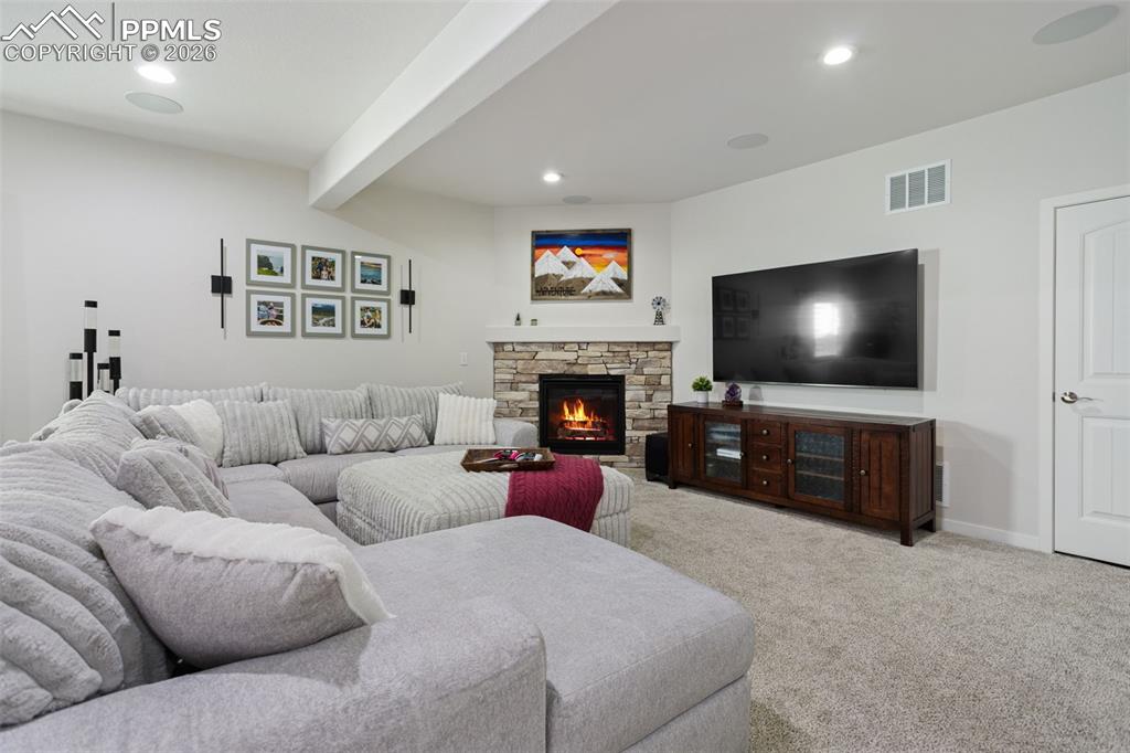 Lower level family room with gas fireplace