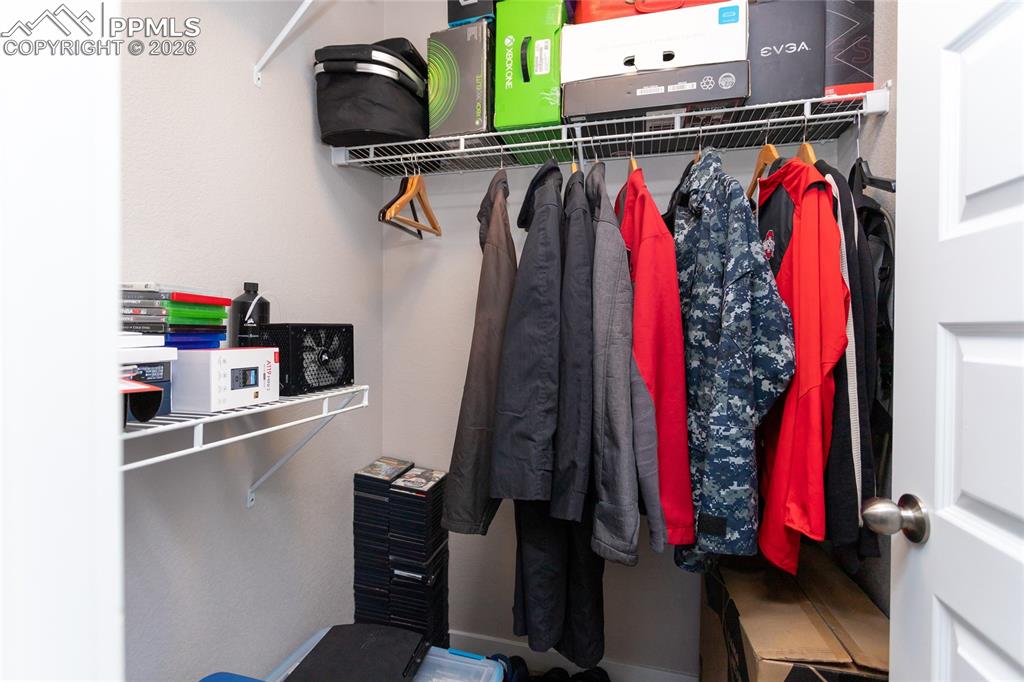 Walk in closet in secondary bedroom