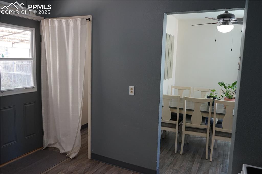 View from the kitchen to dining area and laundry room/back door