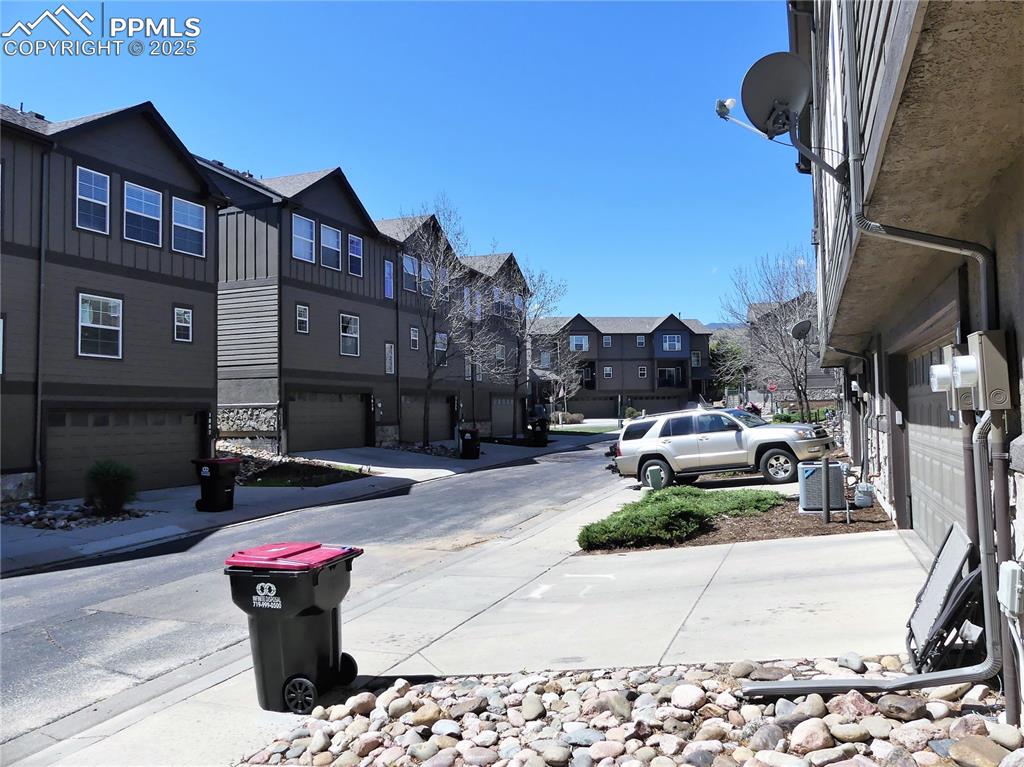 View of road with sidewalks and a residential view