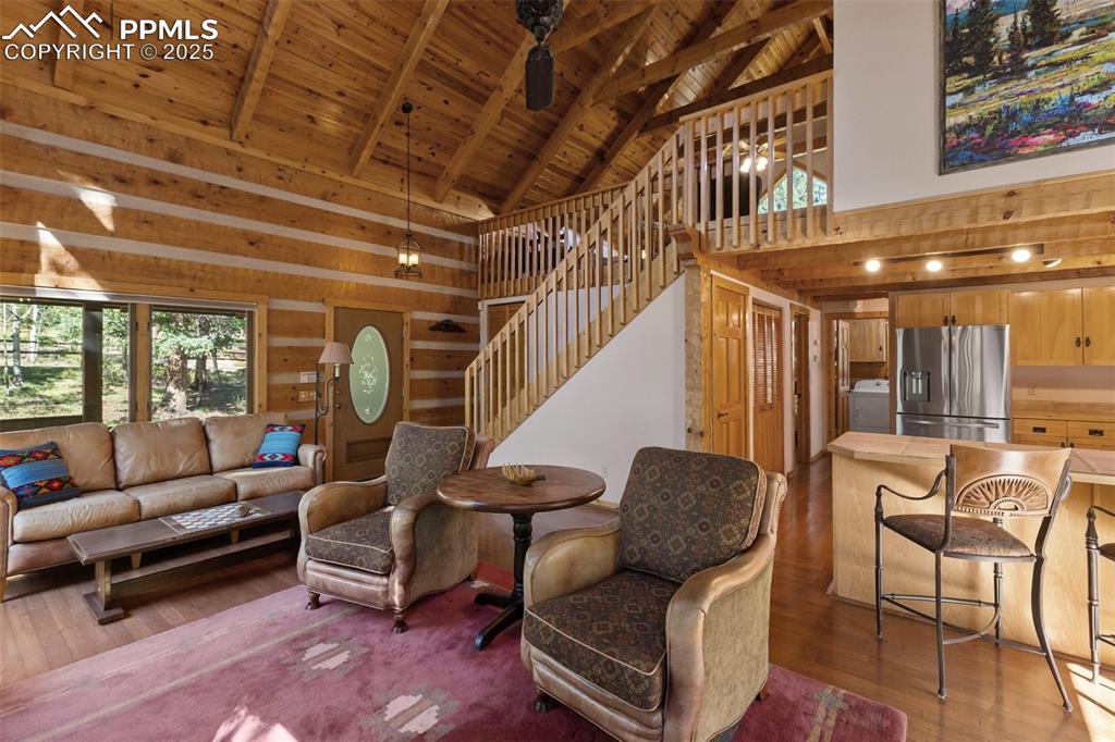 Tongue and Groove Vaulted Ceiling with Hand Hewn Trusses 