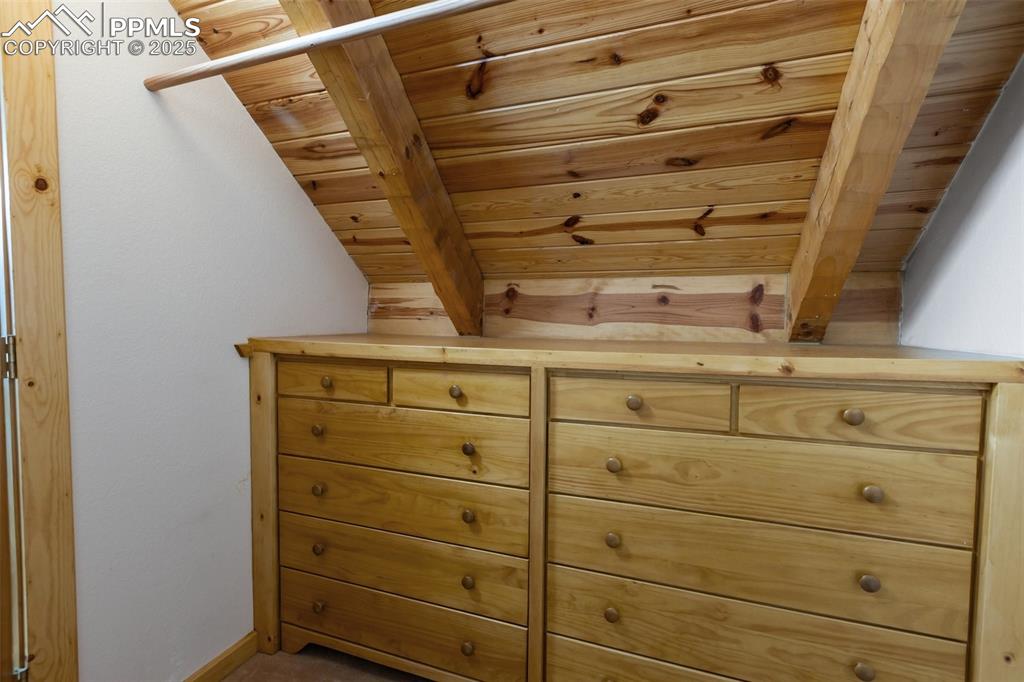 Primary closet includes built-in dresser