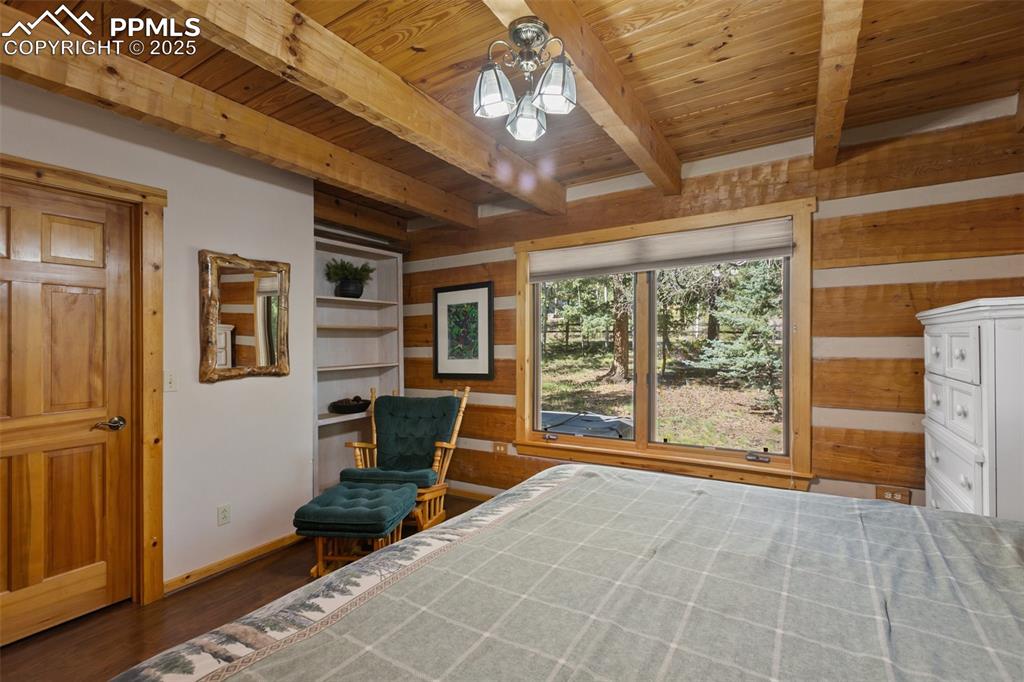 Bedroom #2 on the main level, includes walk-in closet and could double as the primary bedroom.