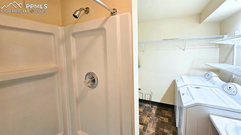 Stand-alone shower, sink, toilet in laundry room