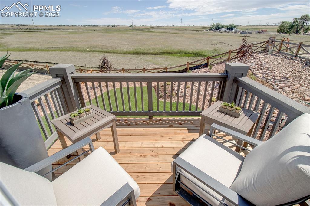 Deck featuring a view of rural / pastoral area