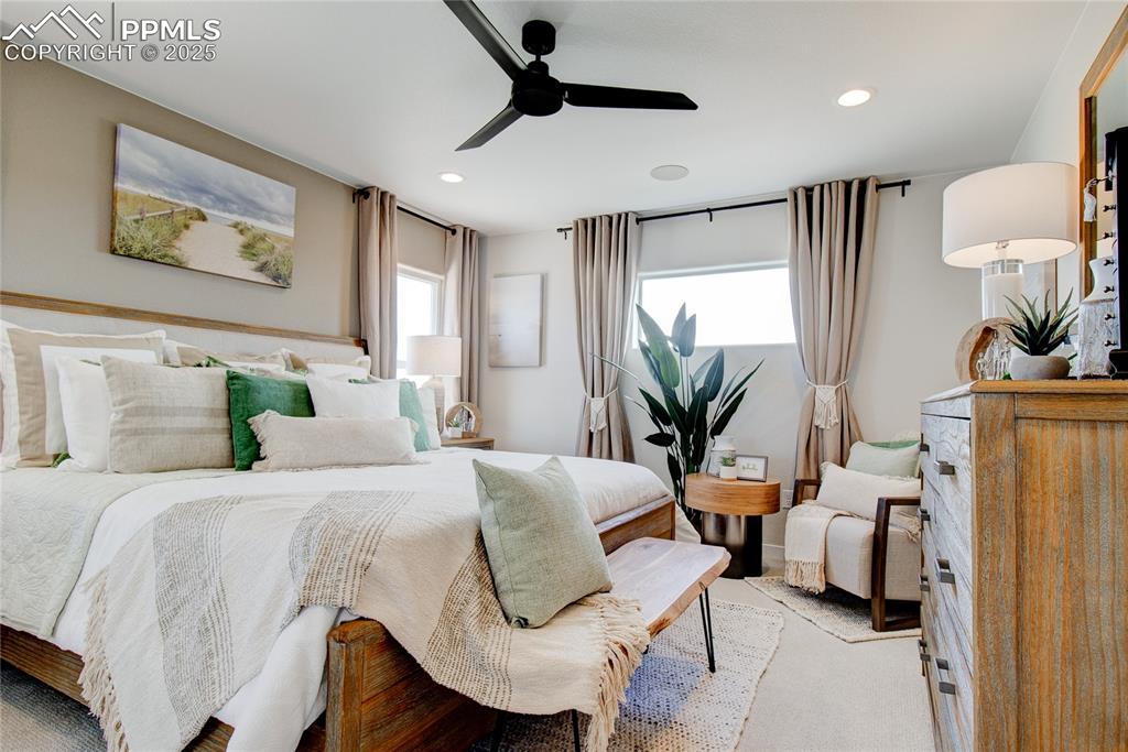Bedroom featuring ceiling fan and recessed lighting
