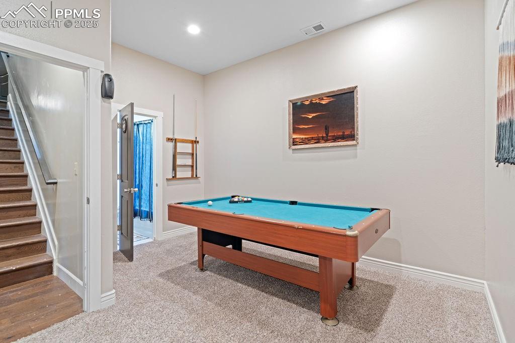 Recreation room featuring light carpet, pool table, and recessed lighting