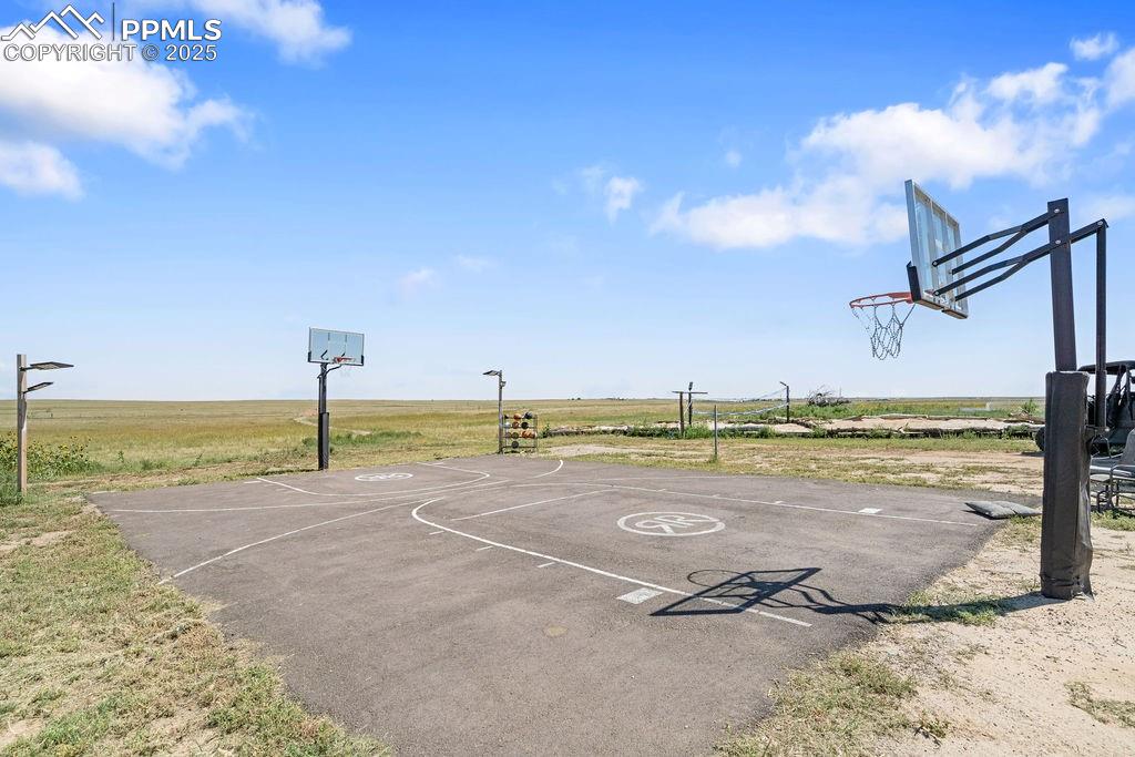 View of sport court featuring community basketball court