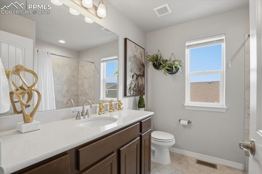 Bright second floor bathroom conveniently located near the additional bedrooms
