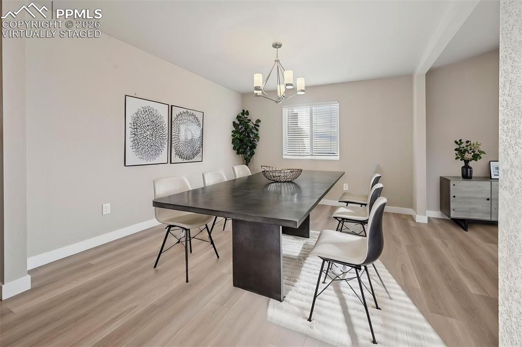 Virtually staged formal dining room, can be used as office! 